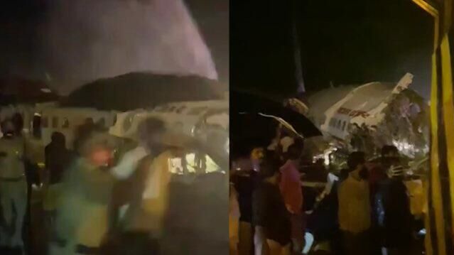 Спасатели тушат расколовшийся после посадки пассажирский самолет в Индии - РИА Новости, 1920, 07.08.2020