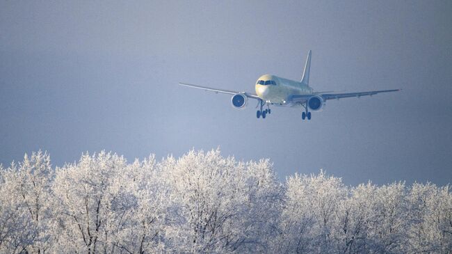 Самолет МС-21-310, оснащенный новыми российскими двигателями ПД-14, совершает посадку на аэродроме Иркутского авиационного завода