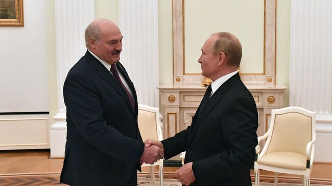 Президент РФ Владимир Путин и президент Белоруссии Александр Лукашенко во время встречи