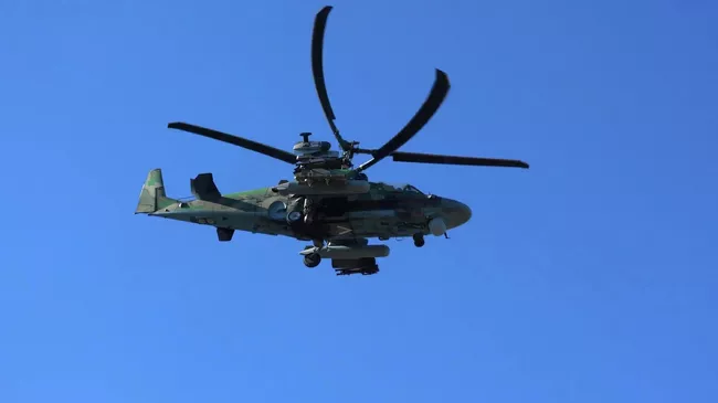 Ударный вертолет Ка-52 ВКС России отправляется на боевое задание для уничтожения позиций ВСУ