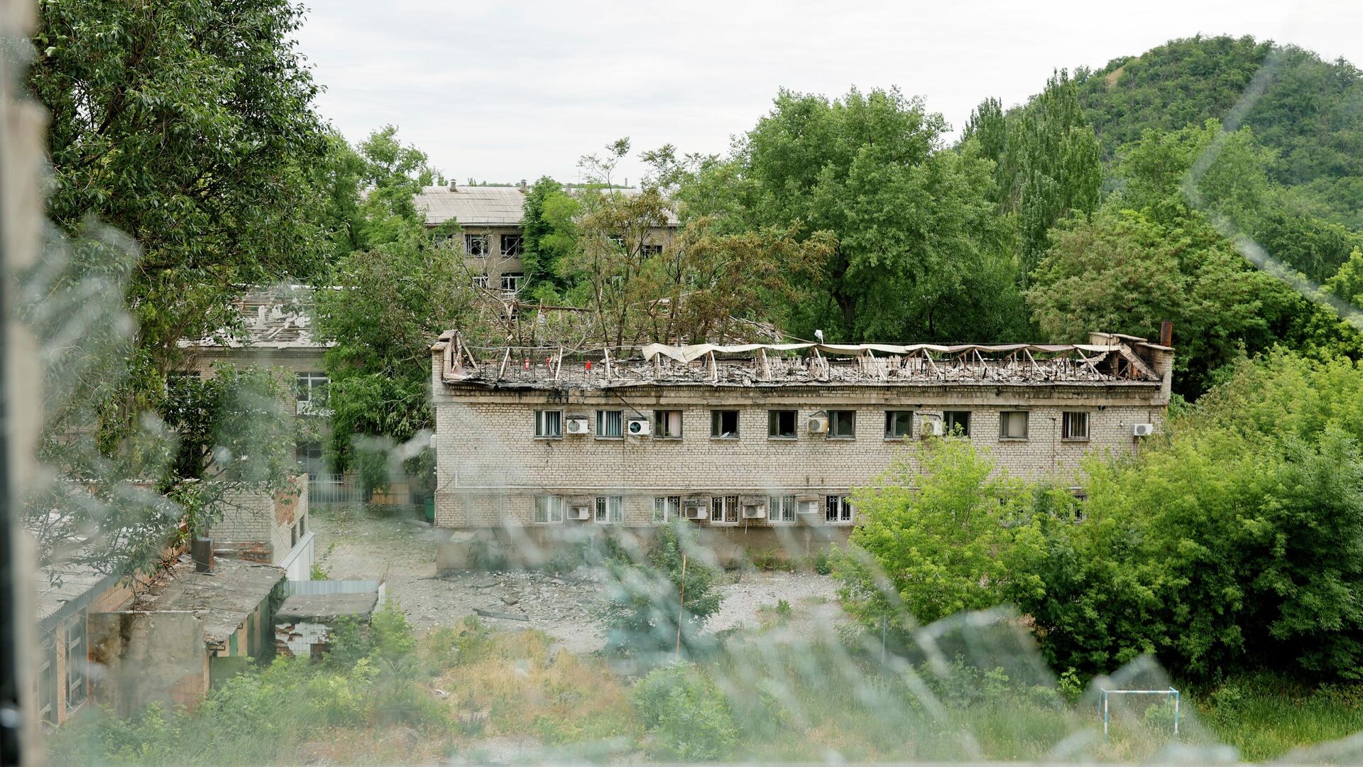 Последствия обстрела в Донецке  - РИА Новости, 1920, 23.06.2022