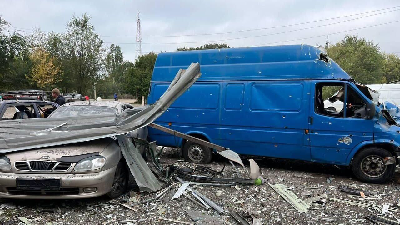 На месте обстрела колонны автомобилей, стоящих на выезде в освобожденную часть Запорожья - РИА Новости, 1920, 30.09.2022