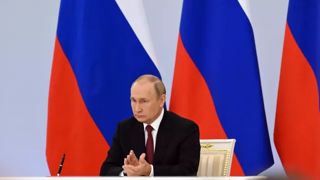 Президент России Владимир Путин выступает на церемонии подписания договоров о вхождении в Российскую Федерацию  Донецкой и Луганской народных республик, Запорожской и Херсонской областей в Кремле