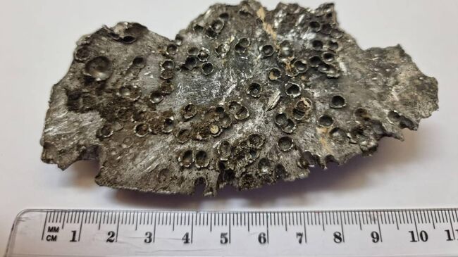 Осколок боеприпаса к HIMARS, применяемых ВСУ. Архивное фото