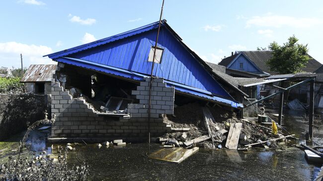 Поврежденный дом в городе Голая Пристань Херсонской области, затопленном после разрушения Каховской ГЭС. Архивное фото