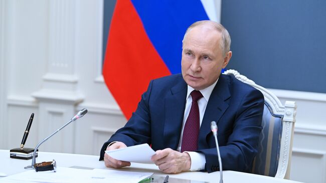 Президент РФ Владимир Путин принимает в режиме видеоконференции участие в заседании Совета глав государств – членов ШОС