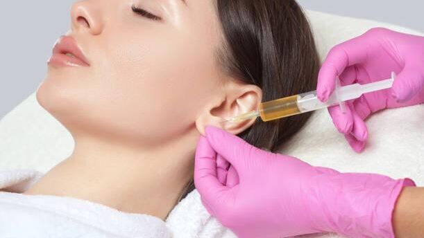 ботокс в ухо - РИА Новости, 1920, 18.03.2026