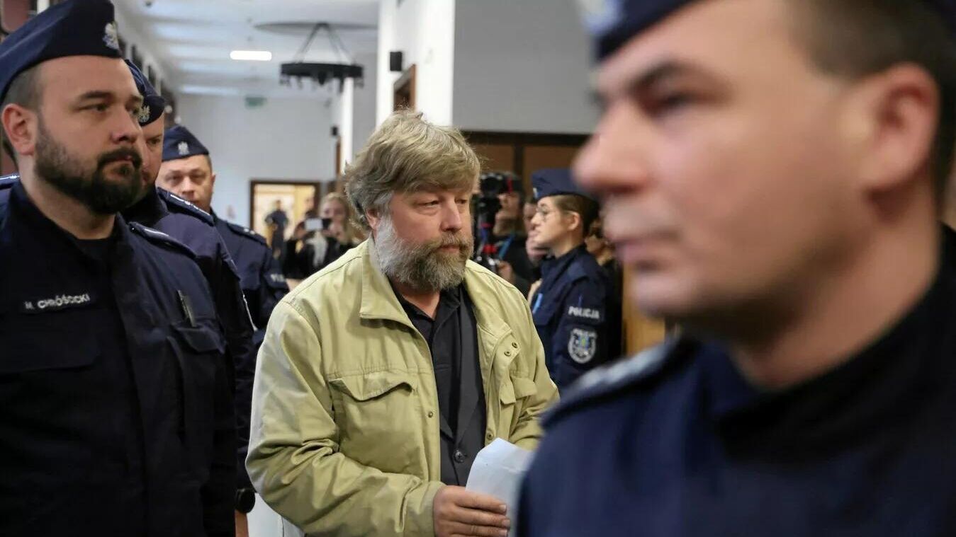 Российский археолог Александр Бутягин в районном суде Варшавы - РИА Новости, 1920, 18.03.2026