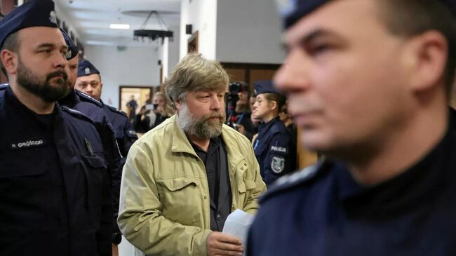 Российский археолог Александр Бутягин в районном суде Варшавы