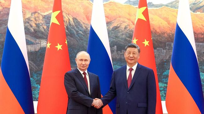 Путин и Си Цзиньпин во время российско-китайских переговоров в Пекине 20 мая