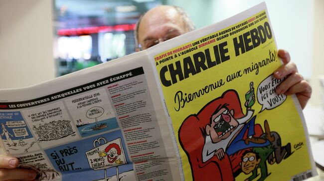 Издание Charlie Hebdo опубликовало карикатуры, героем которых стал утонувший сирийский мальчик Айлан Курди