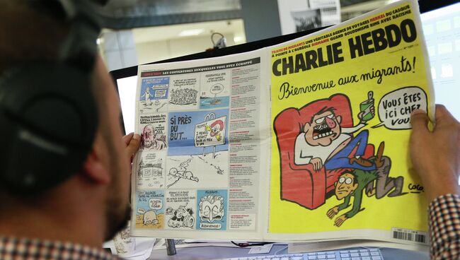 Издание Charlie Hebdo опубликовало карикатуры, героем которых стал утонувший сирийский мальчик Айлан Курди