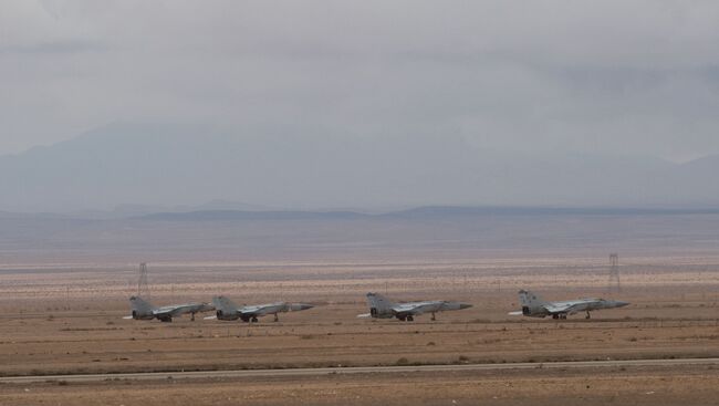 Самолеты сирийских ВВС на базе Военно-воздушных сил Сирии в провинции Хомс