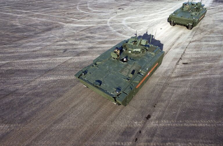 Бронетранспортер (БТР) на гусеничной платформе Курганец-25 на репетиции военного парада Бронетранспортер (БТР) на гусеничной платформе Курганец-25 на репетиции военного парада