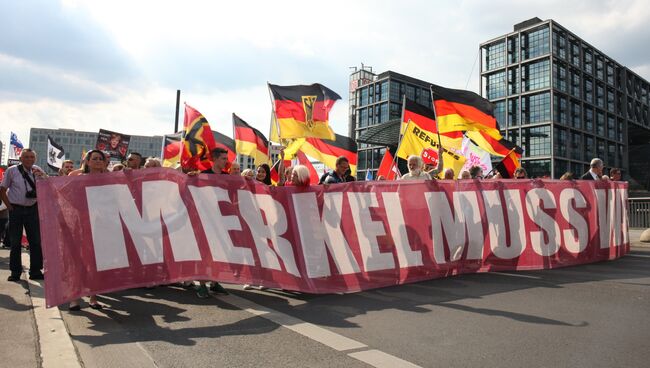 Акция протеста против политики Ангелы Меркель в Берлине