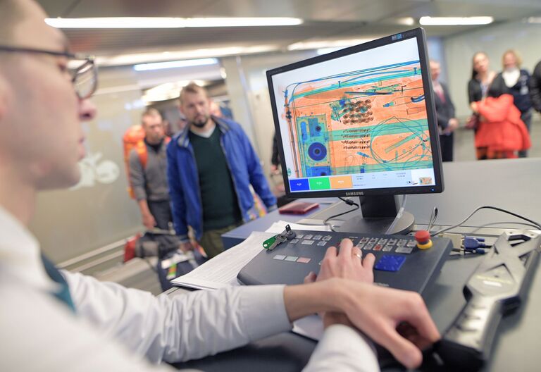 Досмотр багажа в аэрополрту