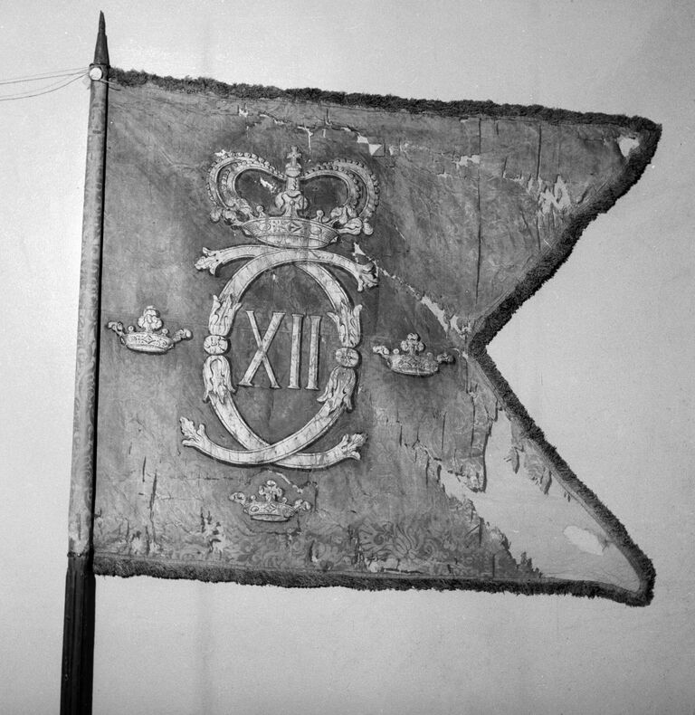 Трофейное знамя, отбитое русскими войсками у шведских захватчиков в Северной войне 1700-1721 гг. Трофейное знамя, отбитое русскими войсками у шведских захватчиков в Северной войне 1700-1721 гг.