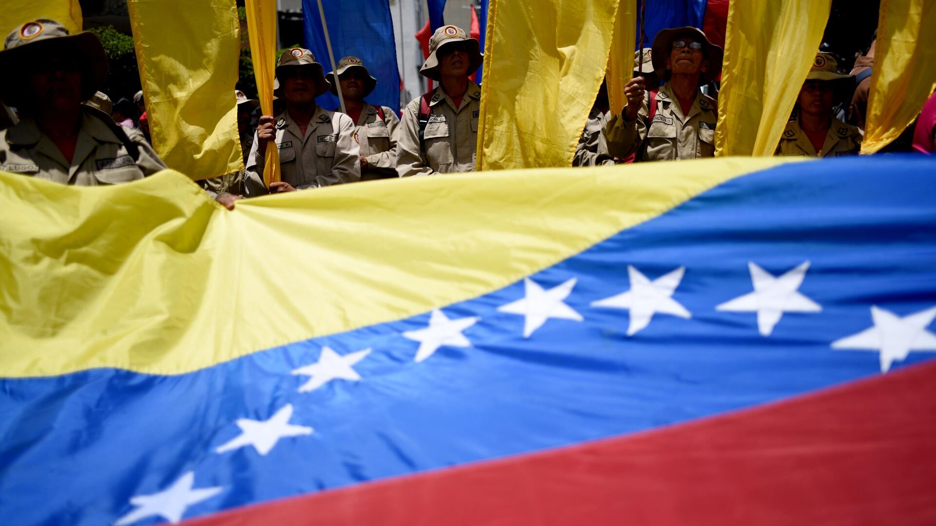 Участники акции протеста против санкционной политики США на одной из улиц Каракаса - РИА Новости, 1920, 08.09.2025