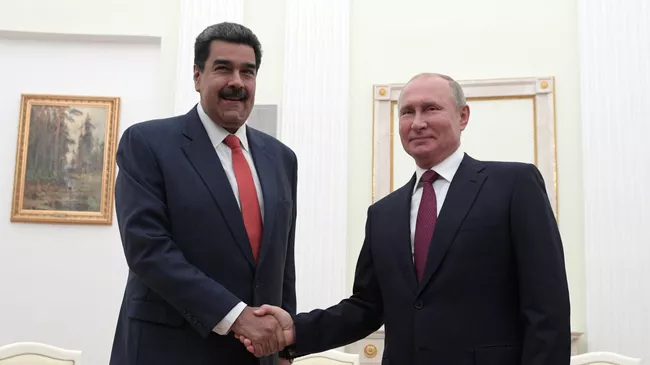 Президент РФ Владимир Путин и президент Венесуэлы Николас Мадуро во время встречи