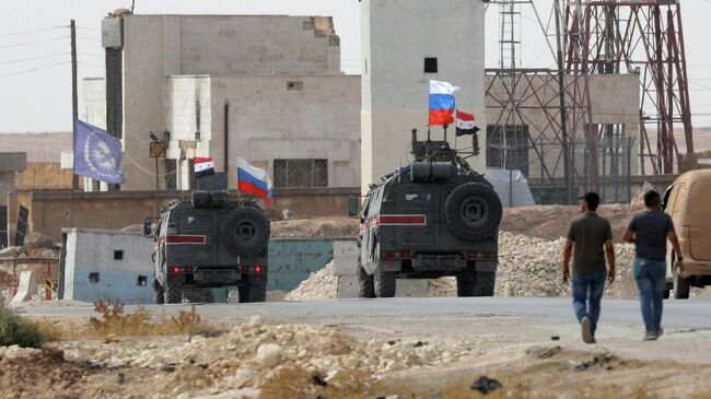 Патруль российской военной полиции в сирийском городе Манбидж. 15 октября 2019