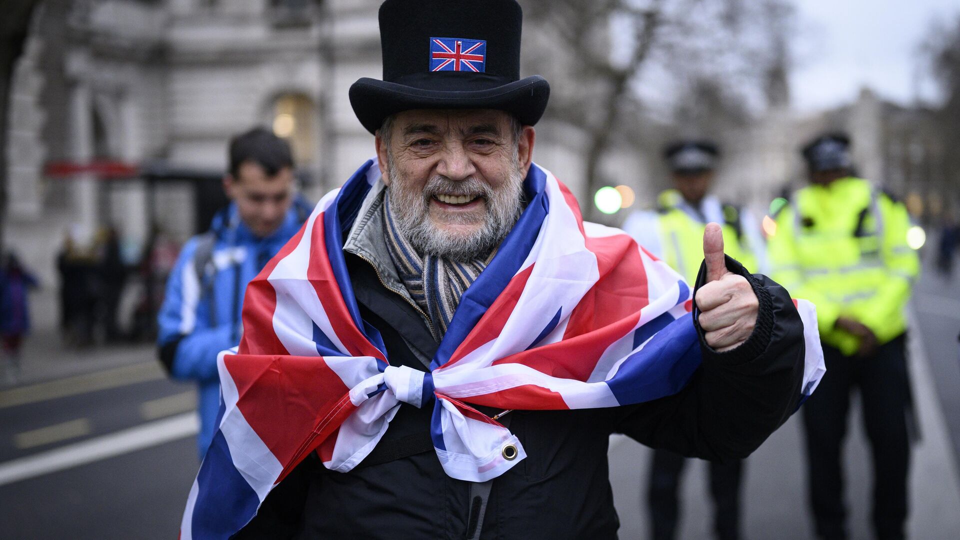 Сторонник Brexit на торжественных мероприятиях, посвященных выходу Великобритании из ЕС (Brexit Party) на площади Парламента в Лондоне - РИА Новости, 1920, 28.09.2021